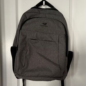 Gray Men's Backpack with luggage strap and charging port in a Heathered grey
